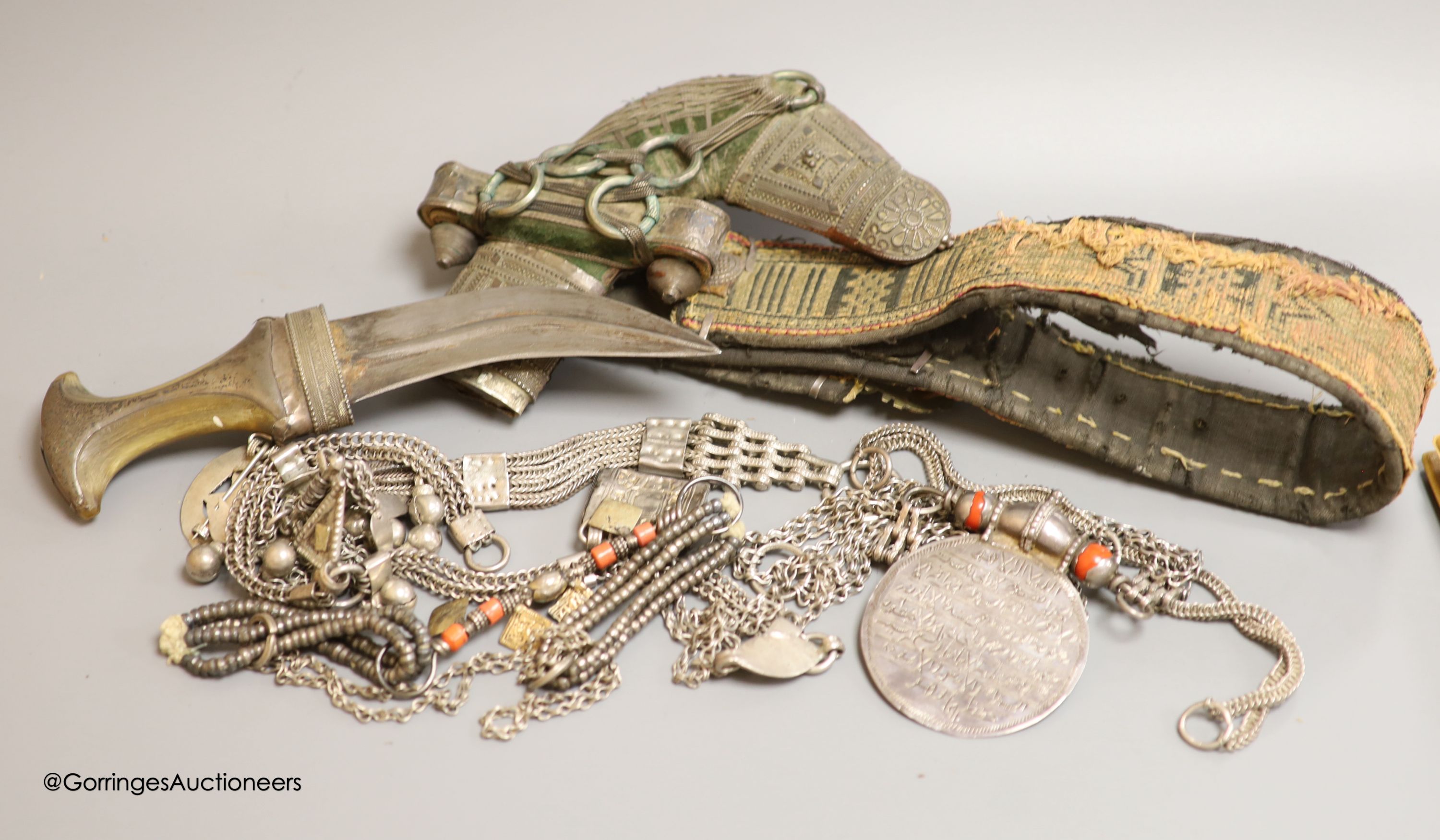 An Arab white metal Jambiya and a group of mainly Arab white metal items